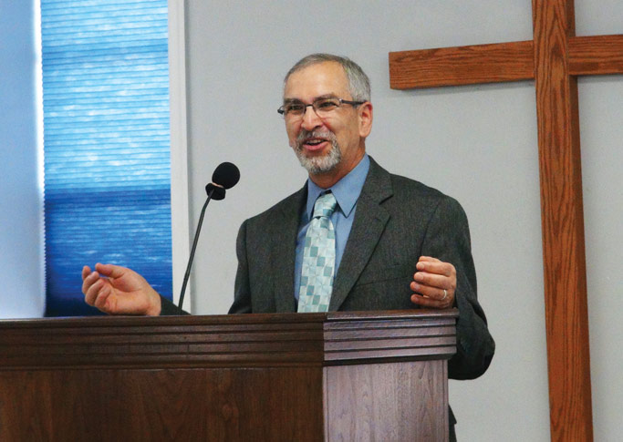 Earl Zimmerman speaks at his installation service at Northern Virginia Mennonite Church. Courtesy photo
