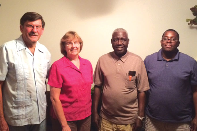 James and Aldine Musser with Bishop John Nyagwegwe and his son, Alberto Othuon. Courtesy of author